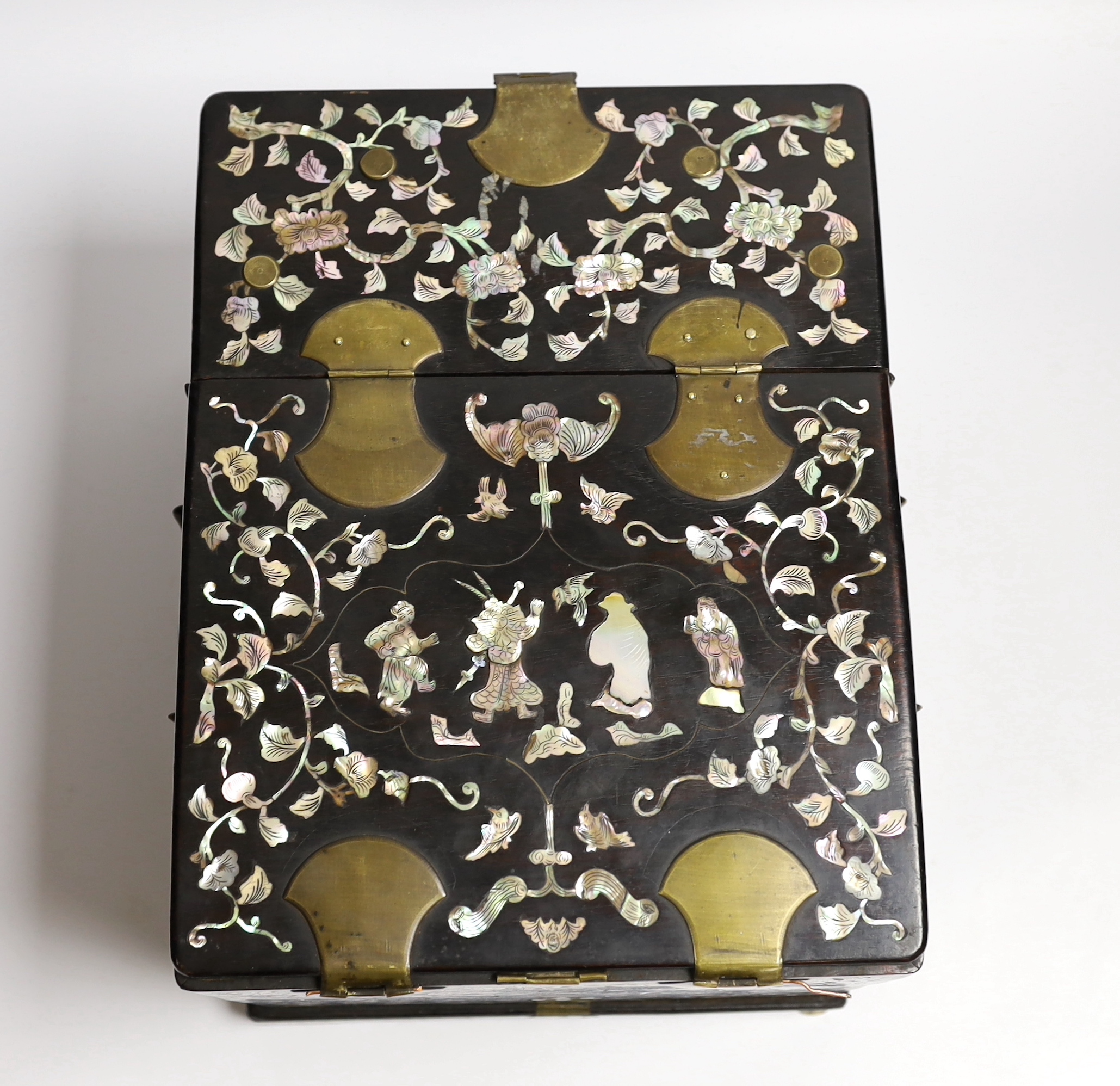 A Chinese mother-of- pearl inlaid hongmu vanity cabinet, late Qing dynasty, with fitted interior comprising a mirror, drawers, etc. 24cm x 31cm x 20cm